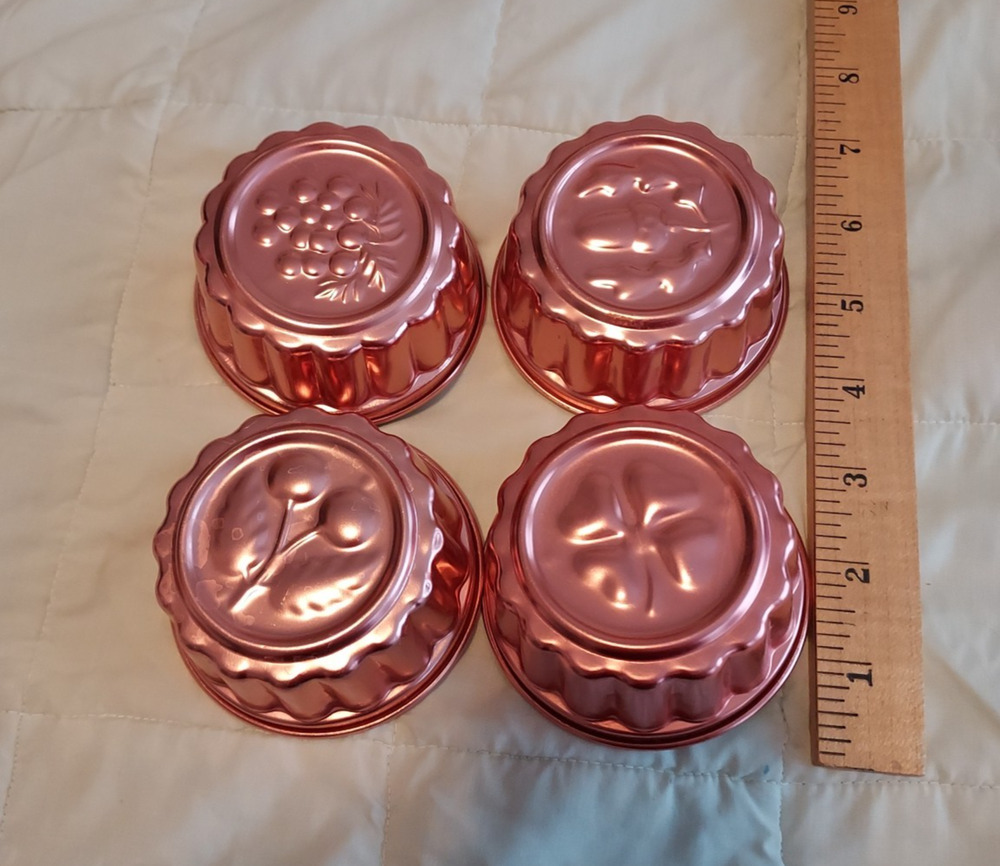 Vintage Aluminum Jello Molds that are Copper colored EUC wonderful 3.5 in across